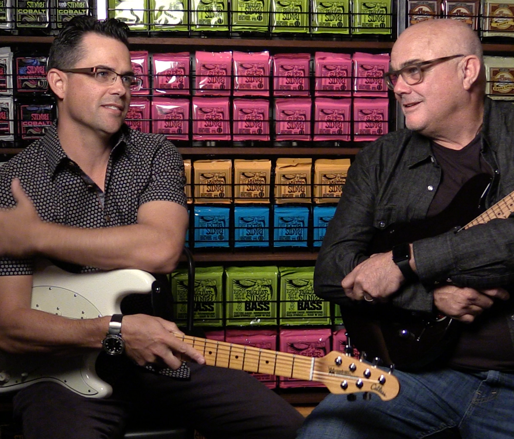 Brian Ball and father Sterling Ball, who run the Ernie Ball guitar company, in an interview.