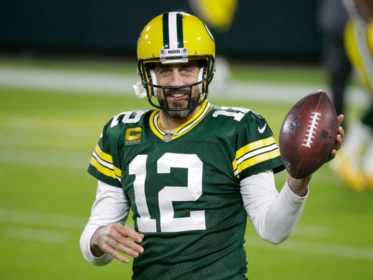Aaron Rodgers warms up before a Chicago-Green Bay game in November 2020. The Pack went on to win its second consecutive NFC North divisional title, with a 13-3 record.