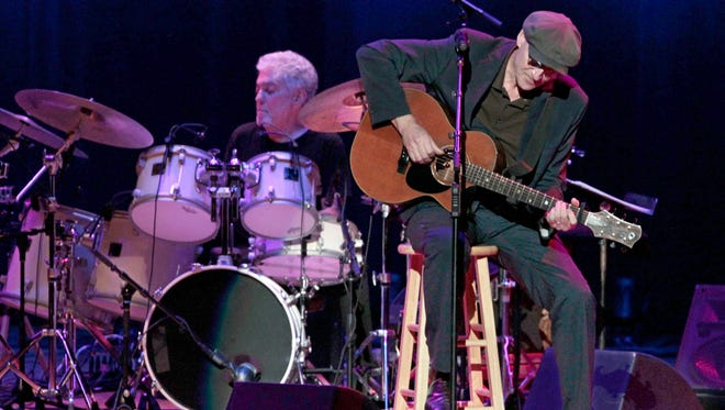 James Taylor joins in as the special surprise guest with Steve Gadd and his band during Gadd's headline performance at the Kodak Hall at Eastman Theatre on day eight of the Xerox Rochester International Jazz Festival Friday.