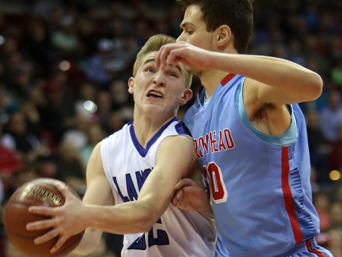 Brookfield Central's Gage Malensek drives into Arrowhead's