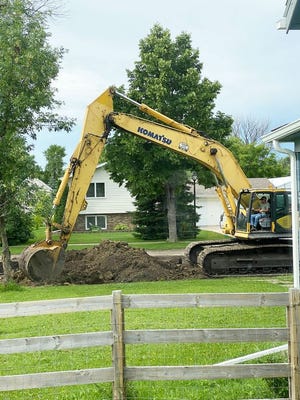 Street reconstruction on 5th Avenue South started this week with Davidson Ready Mix Construction of Holt, Minnesota, pictured here, digging up the road and laying dirt Monday and Tuesday.