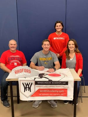 Zack Whitacre, surrounded by parents Seth and Keri Whitacre and brother Brady Whitacre, signed Friday to continue his baseball and academic careers at Division I Radford University.