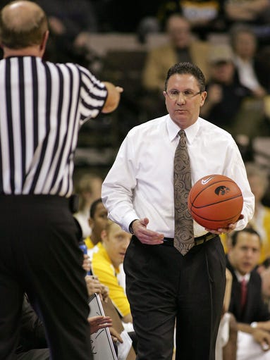 Former Iowa coach Todd Lickliter ends up holding ball