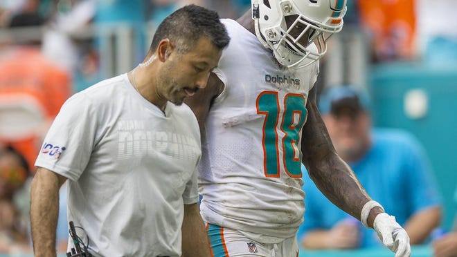 Dolphins receiver Preston Williams walks off the field after an injury against the New York Jets that ended his rookie season.