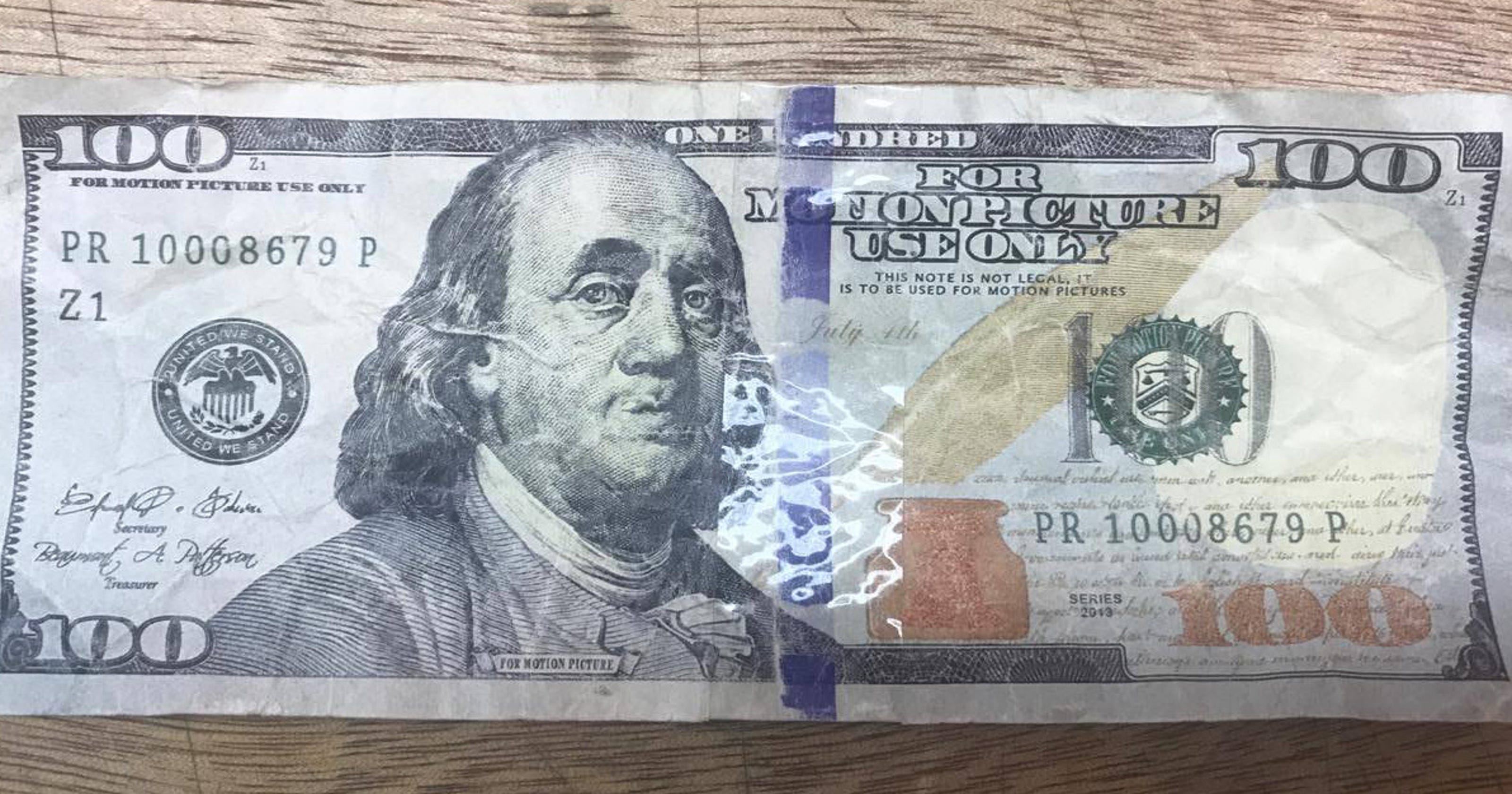 Police Counterfeit 100 bill used at Asan store