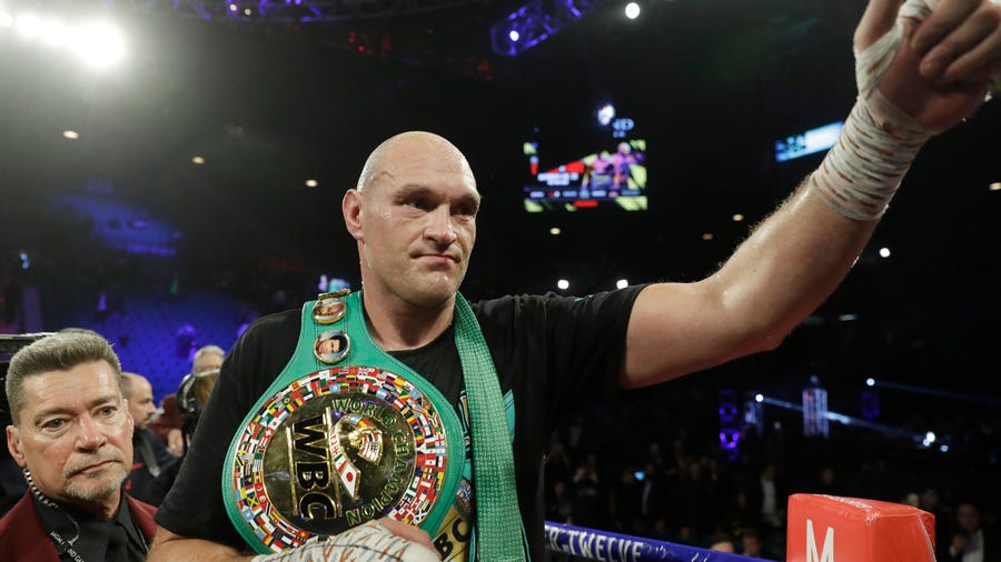 Tyson Fury, of England, celebrates after defeating Deontay Wilder during a WBC heavyweight championship boxing match Saturday, Feb. 22, 2020, in Las Vegas. (AP Photo/Isaac Brekken) ORG XMIT: NVJL325