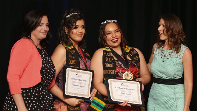 Lee County high school students Alexandra Lozano, second from left, and Judith Otero accept academic scholarships on Saturday from Florida Southwestern State College representatives Danielle Busby, left, and Ashley Crilly during the Nations Association gala at the Crowne Plaza Fort Myers.