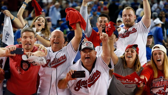 Cleveland Indians fans celebrate after the Cleveland Indians beat the Toronto Blue Jays in game five of the 2016 ALCS playoff baseball series at Rogers Centre on Oct. 19.