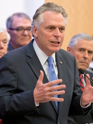 FILE This Friday Jan. 29, 2016 file photo shows Virginia Gov. Terry McAuliffe during a press conference at the Capitol in Richmond, Va. The Virginia Supreme Court has rejected Republican lawmakers' bid to block Gov. Terry McAuliffe's latest effort to restore the voting rights of thousands of felons who've completed their sentences. (AP Photo/Steve Helber)