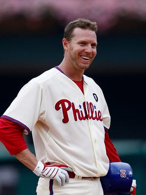 FILE - In this July 24, 2011, file photo, Philadelphia Phillies' Roy Halladay stands on second base during a baseball game against the San Diego Padres, in Philadelphia. Career saves leader Mariano Rivera and late pitcher Roy Halladay are among 20 new candidates on the Hall of Fame ballot for the Baseball Writers' Association of America, joined by 15 holdovers headed by Edgar Martinez. (AP Photo/Matt Slocum, File)