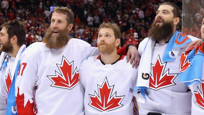 Flyers captain Claude Giroux, center, didn't play much in the World Cup for Canada.