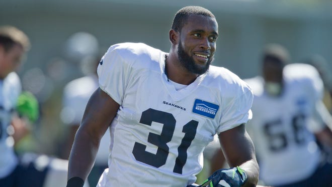 Seattle Seahawks' Kam Chancellor (31) attends NFL football practice for the first time after holding out over a contract dispute, on Wednesday, Sept. 23, 2015 at the team headquarters in Renton, Wash.