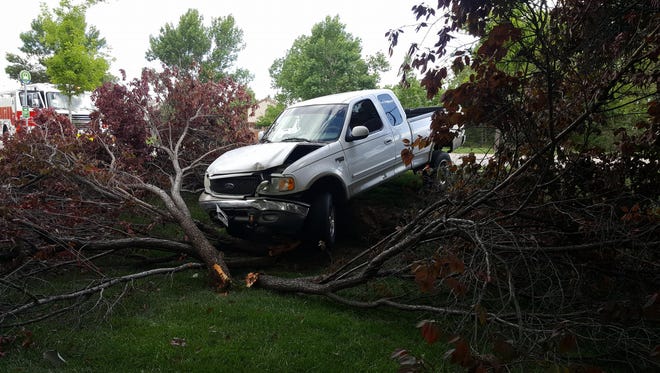 A white truck ran off the road and over a tree on Horsetooth and Ziegler roads Wednesday, May 30, 2018.