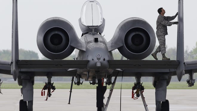 A ground crewsman prepares a A-10 Thunderbolt II from the 107th Fighter Squadron for flight at Selfridge Air National Guard Base in Harrison Township, in this file photo.