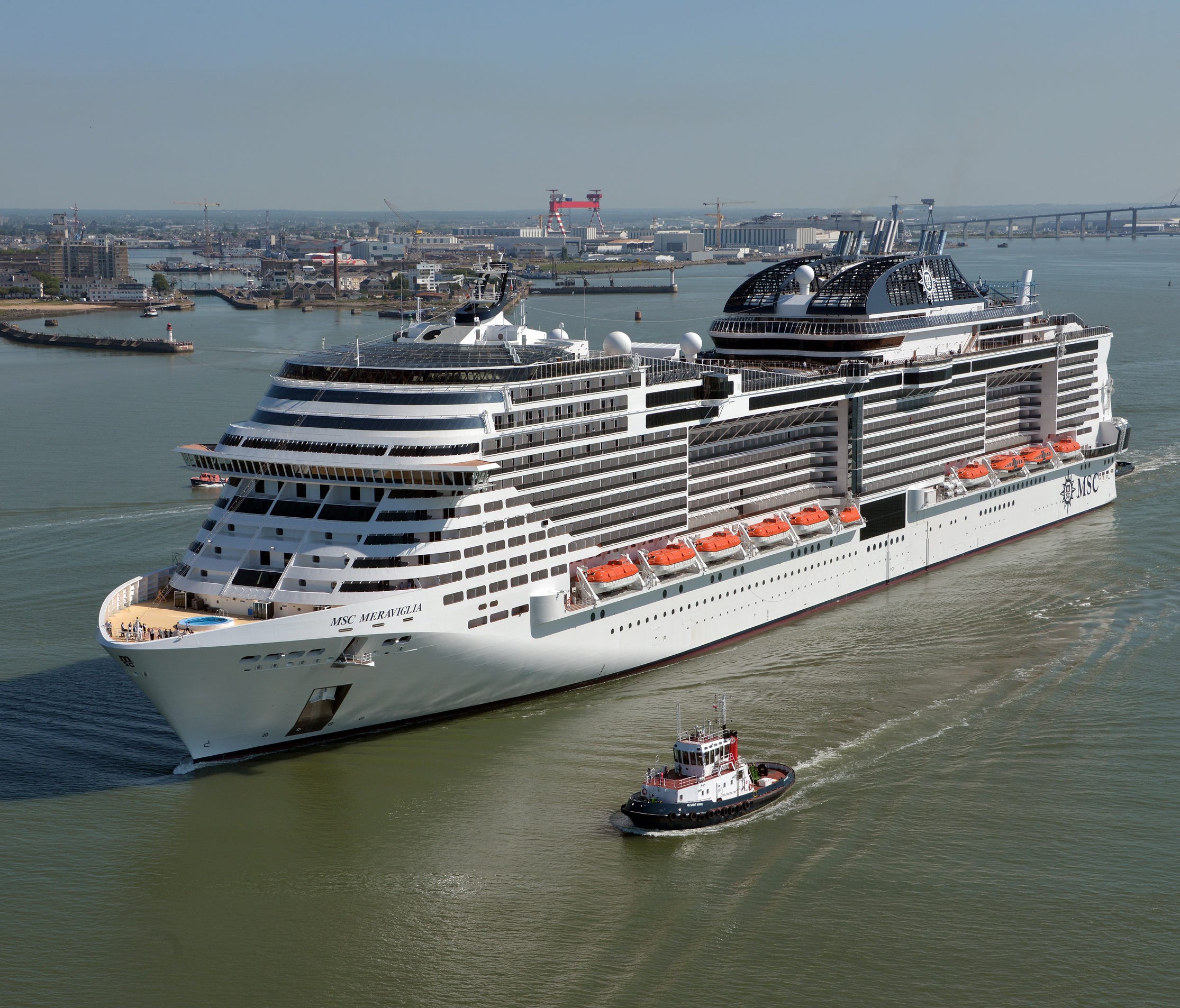 MSC Cruises' 171,598-ton MSC Meraviglia sails from the STX France shipyard in Saint-Nazaire, France in May 2017.