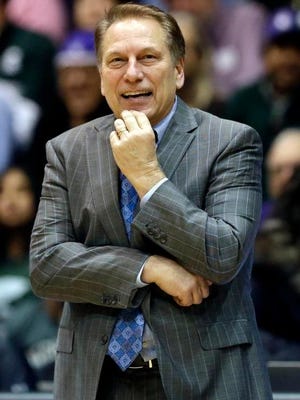 Michigan State head coach Tom Izzo smiles as he watches his team during the second half of an NCAA college basketball game against Northwestern in January.
