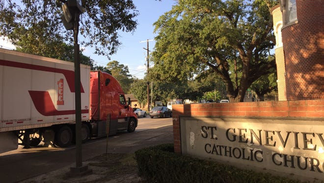 Currently, Evangeline Thruway is just a few yards from historic St. Genevieve Catholic Church. That may change when the I-49 Connector is built in Lafayette, Louisiana. Nov. 3, 2016.