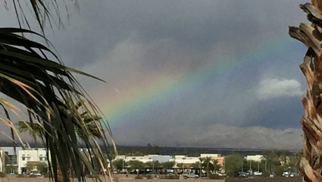 A rainbow spans the sky west of Palm Springs.