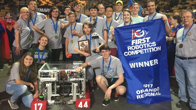 Seacrest Country Day School RoboRays celebrating victory at Orlando FIRST Regional robotics tournament held March 11 – 12.