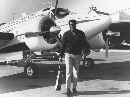 Otis Redding in front of his airplane.
