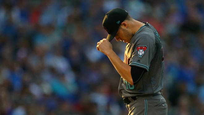 Aug 1, 2017: Arizona Diamondbacks starting pitcher Patrick Corbin (46) reacts against the Chicago Cubs in the first inning at Wrigley Field.