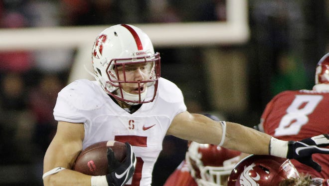 Stanford running back Christian McCaffrey (5), runs against Washington State linebacker Peyton Pelluer (47) during the first half of an NCAA college football game, Saturday, Oct. 31, 2015, in Pullman, Wash.