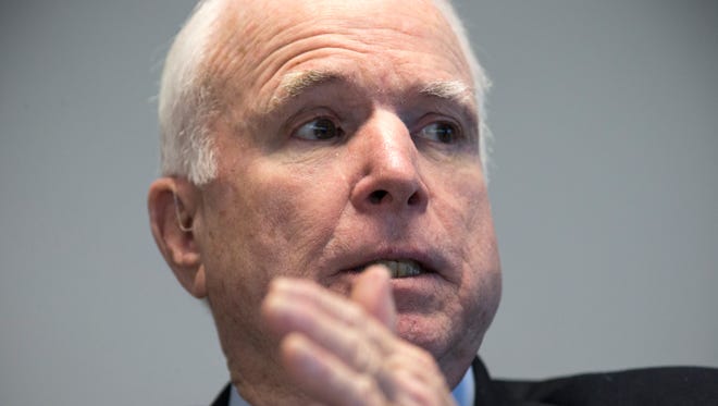 Sen. John McCain, R-Ariz., answers questions from The Arizona Republic's editorial board on Dec. 21, 2015.