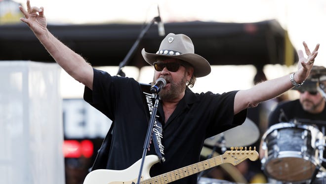 Hank Williams Jr. performs before the NASCAR Sprint Cup Series auto race in Bristol, Tennessee in Aug. 2013.