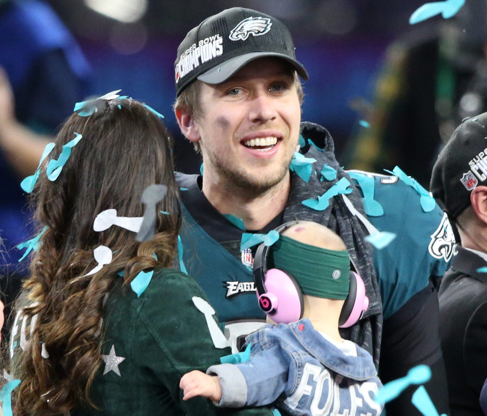 Philadelphia Eagles quarterback Nick Foles (9) celebrates with his wife Tori and daughter Lily after defeating the New England Patriots in Super Bowl LII at U.S. Bank Stadium.