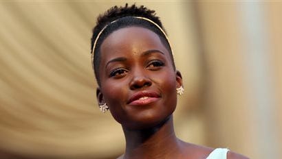 In this file photo, Lupita Nyong'o arrives at the Oscars, at the Dolby Theatre in Los Angeles. Nyong'o is among those being awarded Women of the Year awards by Glamour magazine in a star-studded ceremony Monday at Carnegie Hall in New York.