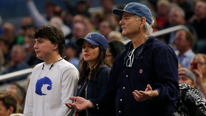 Actor Bill Murray reacts during the second half of Xavier's first-round win against Maryland.