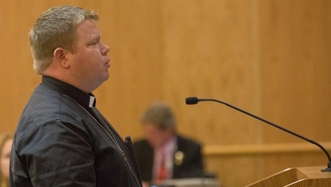Pastor Jared Carson of Peace Lutheran, spoke in defense of County Manager Julia Brown, at the County Commissioners Meeting at the Dona Aña Government Center,  Tuesday, February 14, 2017.