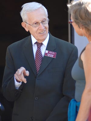 J. Paul Taylor attends the College of Arts and Sciences distinguished alumni homecoming reception in October 2013.