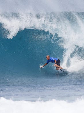 Kelly Slater finished an equal third at the Billabong Pipe Masters at Pipeine in Oahu, Hawaii in this 2016 file photo.