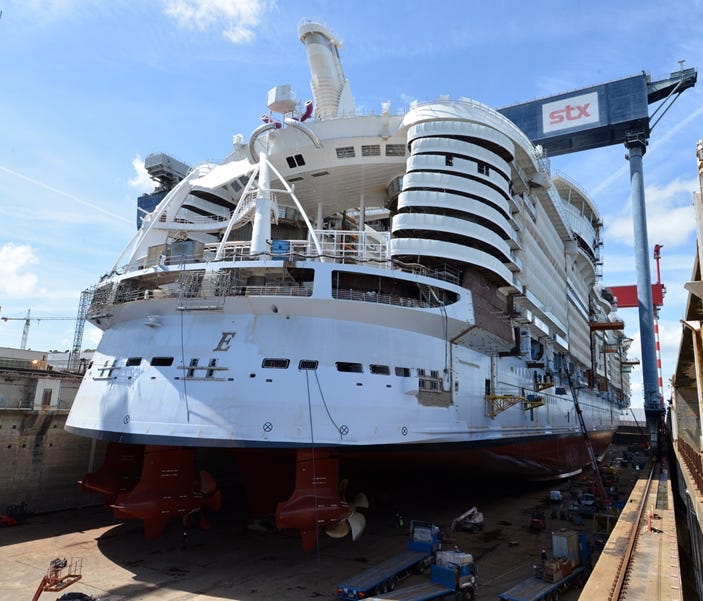Royal Caribbean's Symphony of the Seas in a dry dock at the STX France shipyard in June 2017. Soon after this photo was taken the dry dock was flooded, floating the vessel for the first time.