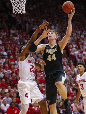Purdue Boilermakers center Isaac Haas (44) shoots the ball against Indiana Hoosiers forward Freddie McSwain Jr. (21) during the game at Simon Skjodt Assembly Hall in Bloomington, Ind., on Wednesday, Jan. 9, 2018.