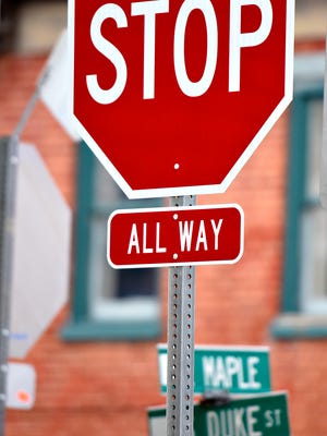 New all way stop signs are shown at South Duke and East Maple streets in York City, Wednesday, Feb. 1, 2017. Dawn J. Sagert photo