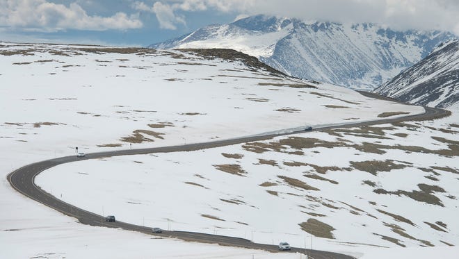 Traffic flows on Trail Ridge Road in Rocky Mountain National Park on Friday, June 2, 2017. The road, topping out at about 12,183 feet in elevation, opened for the season on May 31. 