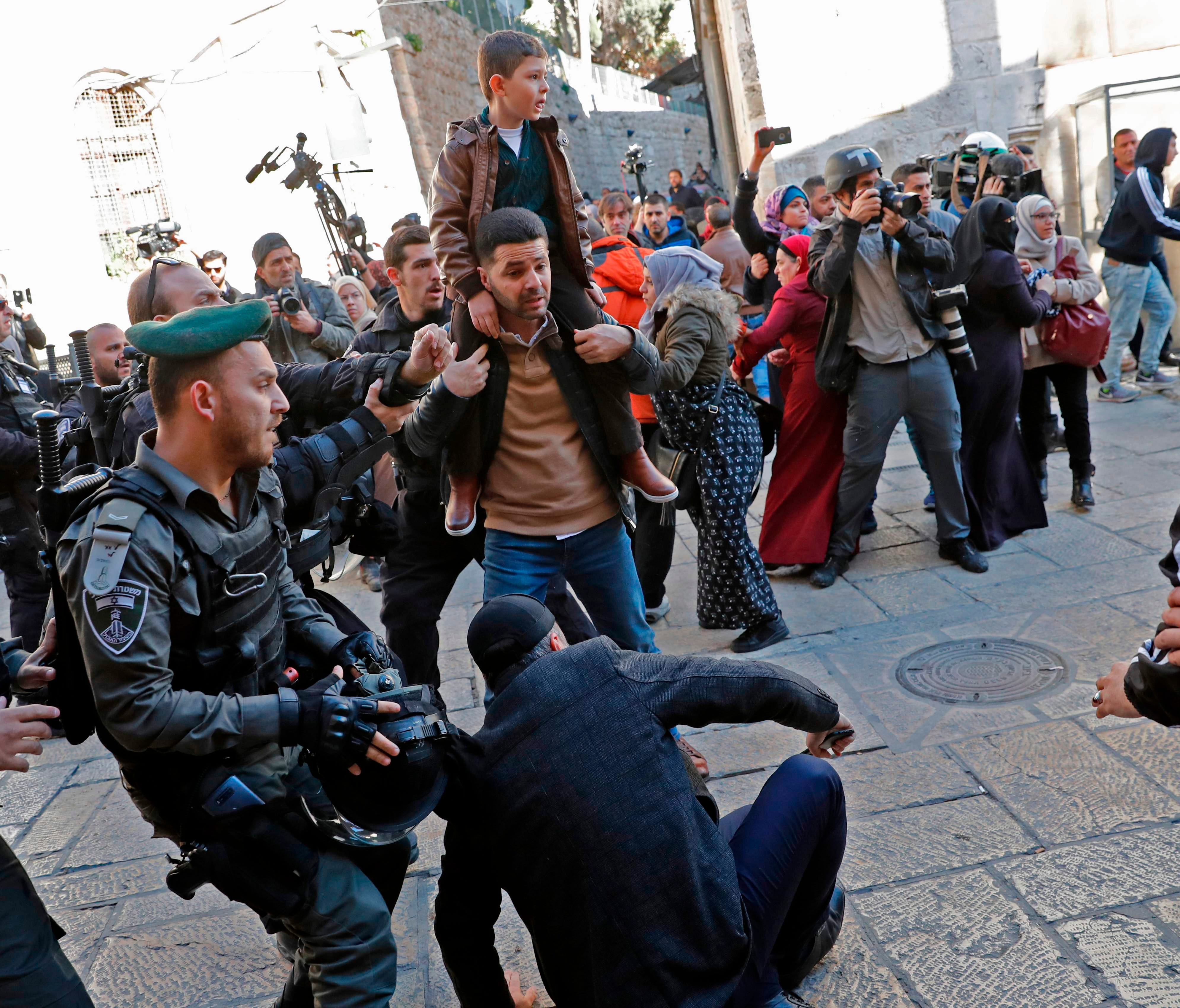 Israeli forces scuffle with people in Jerusalem's Old City on Dec. 8, 2017.