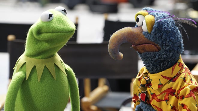 Kermit the Frog, left, and Gonzo the Great appear in a scene from “The Muppets,” premiering Sept. 22.