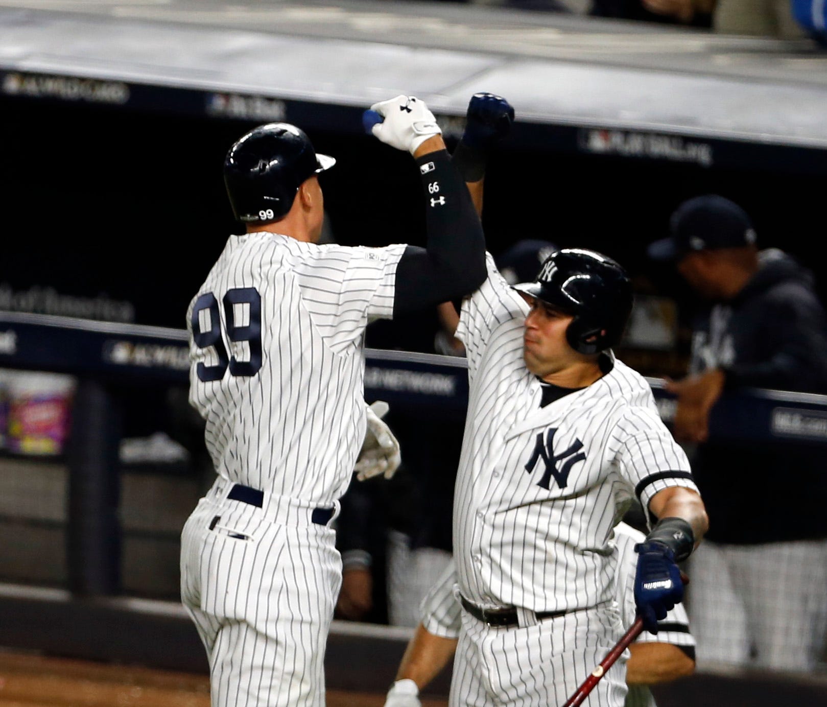 Aaron Judge celebrates with Gary Sanchez after hitting a two run home run in the fourth inning.