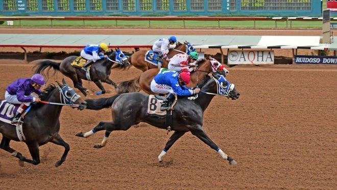 Witman, shown here winning a trial for the All American Futurity on August 22 at Ruidoso Downs, is the 3-to-1 second choice on the morning line for today's $35,100 Animas Quarter Horse Stakes at SunRay Park and Casino.