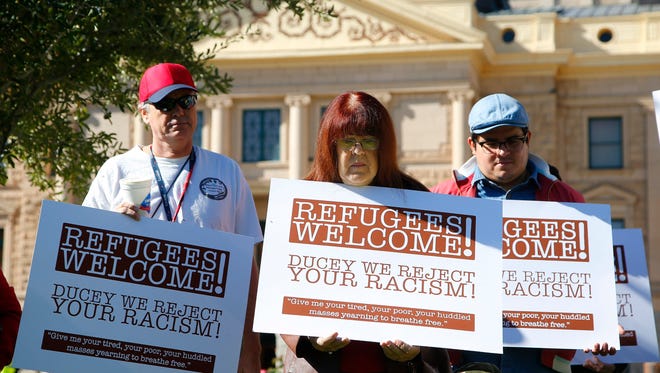 Supporters of welcoming Syrian refugees rally at the Arizona Capitol on Nov. 17, 2015, in Phoenix.