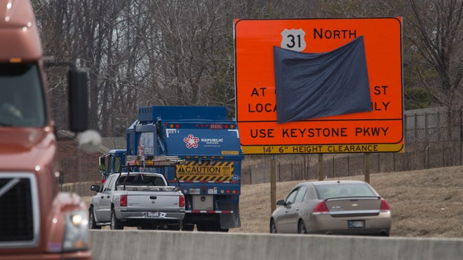 A covered sign on March 31, 2014, announces U.S. 31 North construction that will start April 4 and close the thoroughfare in Carmel through at least October.