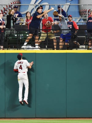 Indians center fielder Bradley Zimmer can't do anything about this home run by Texas shortstop Elvis Andrus.