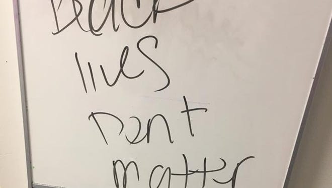 A message Indiana State University freshman McKinsey Glover, 19, said she found on the dry-erase board outside her door at her dorm room.