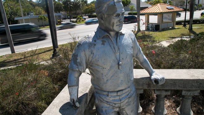The statue of Coach Wes Nott in front of Lee Memorial Hospital needs repair, especially the hand, which has fallen off.