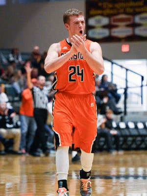 Canistota guard Scott Jolley (24) celebrates at halftime of  their high school basketball game at the Corn Palace for the Hanson Classic on Saturday, Jan. 20, 2018. Canistota beat Langford Area 56-50.
