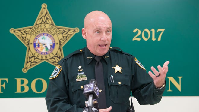 Santa Rosa County Sheriff Bob Johnson announces the arrest of Emanuel Martinez Pose during a press conference Friday, March 8, 2018, at the Santa Rosa County Sheriff’s Office in Milton. Pose was arrested for allegedly taking his two children out of school on Thursday, despite an active domestic violence injunction prohibiting contact.