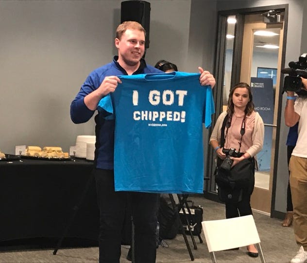 An employee at Three Square Market in River Falls, Wisc., displays an 